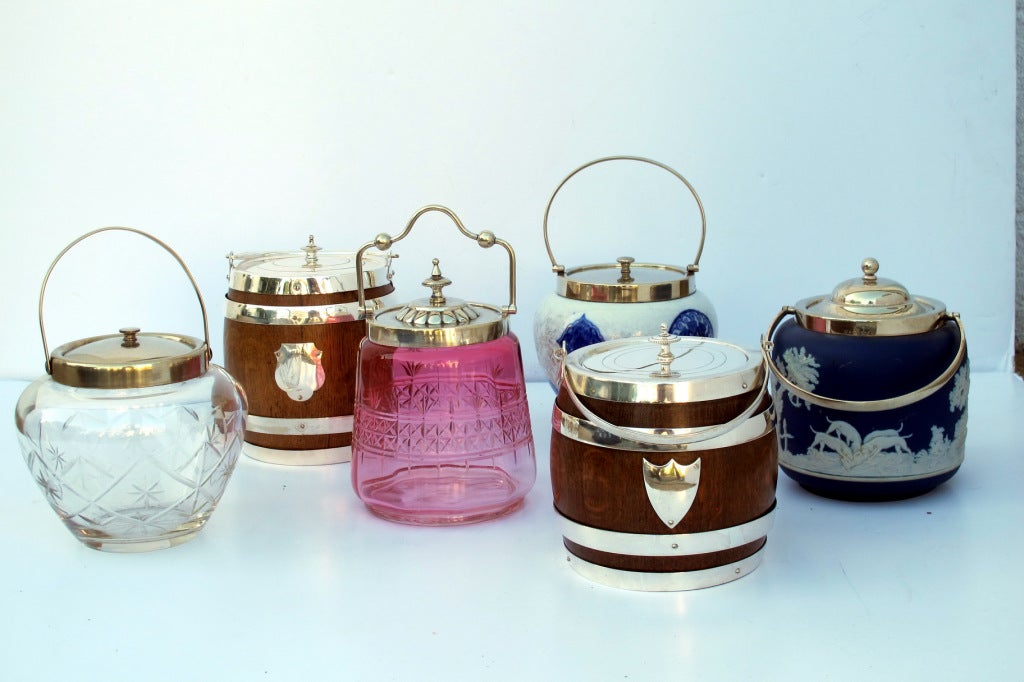 We have a large selection of English Biscuit barrels, in various styles, c 1910 - 1940. Clear Glass $285, Wooden from $ 310, Jasperware $ 465, Pink Glass $ 325