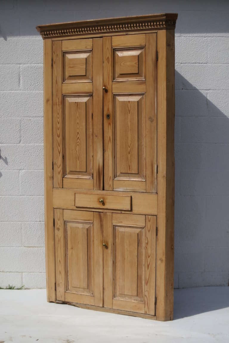 English pine corner cabinet