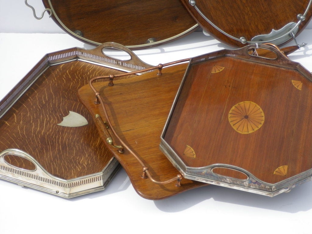 English Early 20th C Trays in various designs, some with silver plate and brass hardware. sold separately
