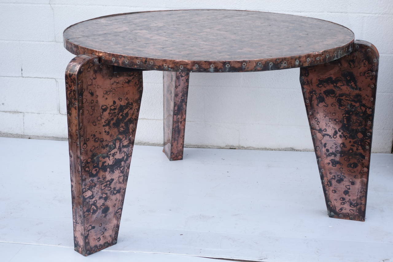 Unusual table, in copper on wood.