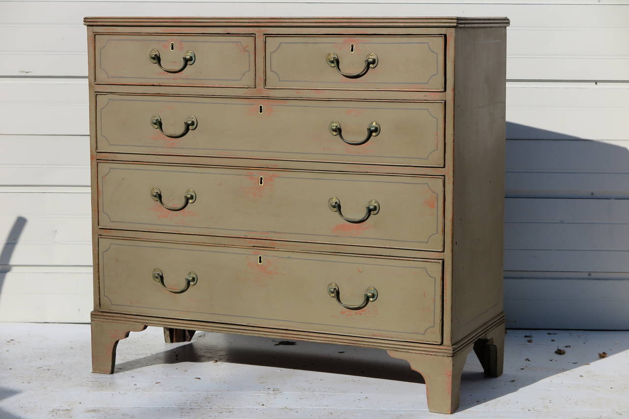 English dresser with later painted finish and stencil design. Original brass hardware. Pine body.