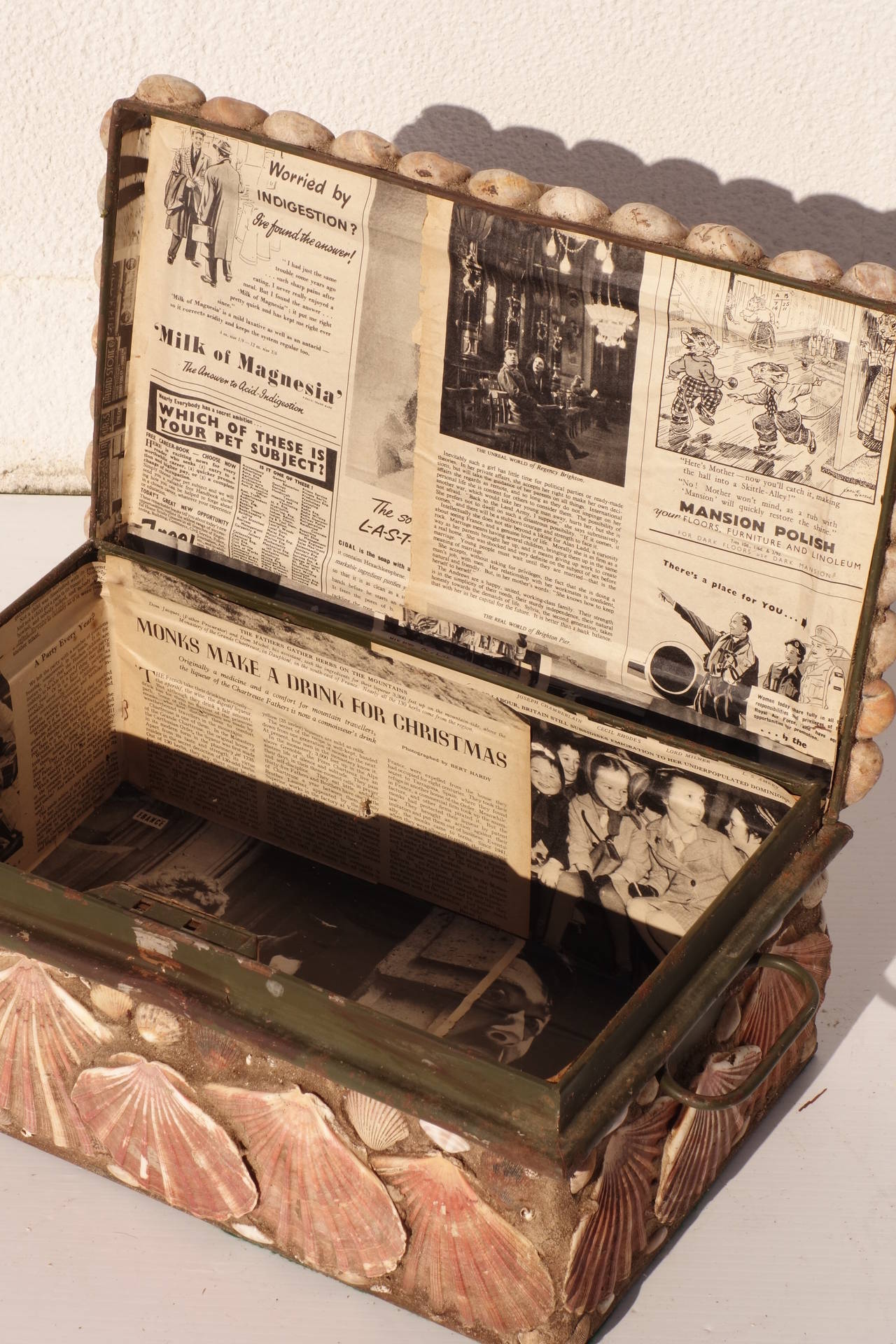 Box with shell decoration and old newspaper lining. Please contact for current availability.