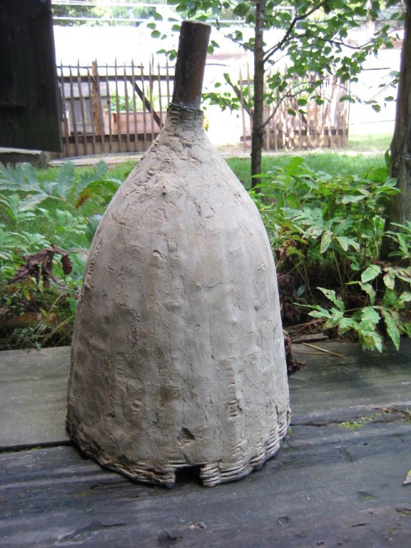 A functional,  sculptural country piece.   A bee skep originally used to house a colony of bees.