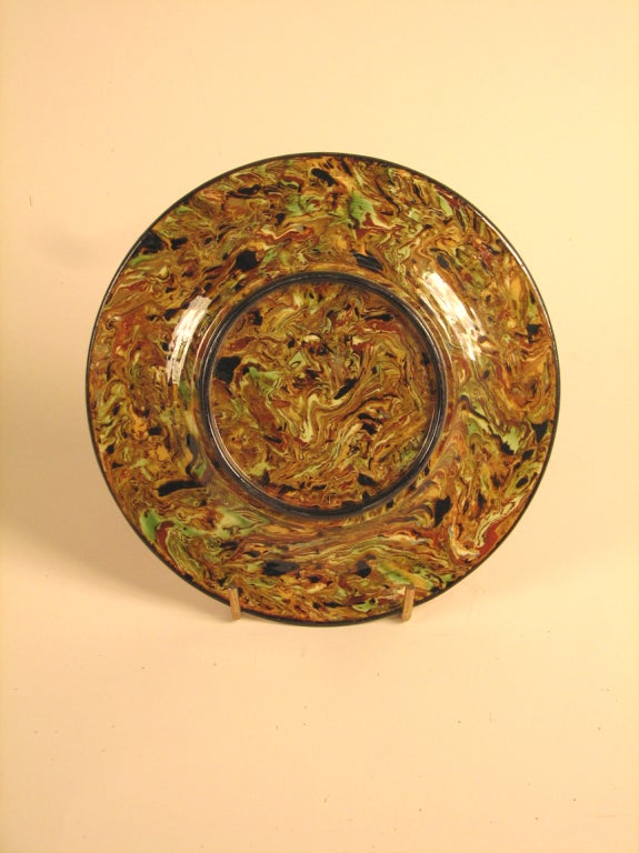 A 19th century mixed earth pottery plate from the Pichon factory. Impressed Signnature. Uzes, France, circa 1860.