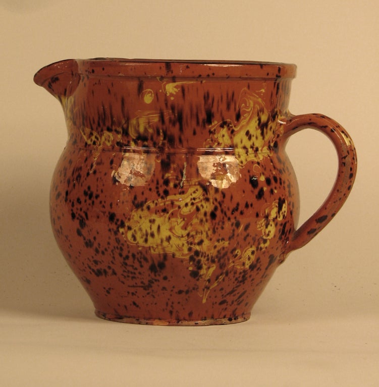 A large red-ware pitcher, France, circa 1840. Levenes region.