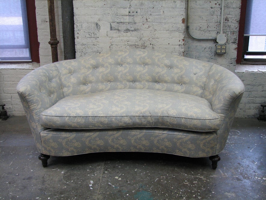 American A Small Victorian Style Camel Back Sofa