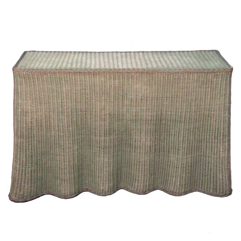 A Faded Skirt Base Wicker Console