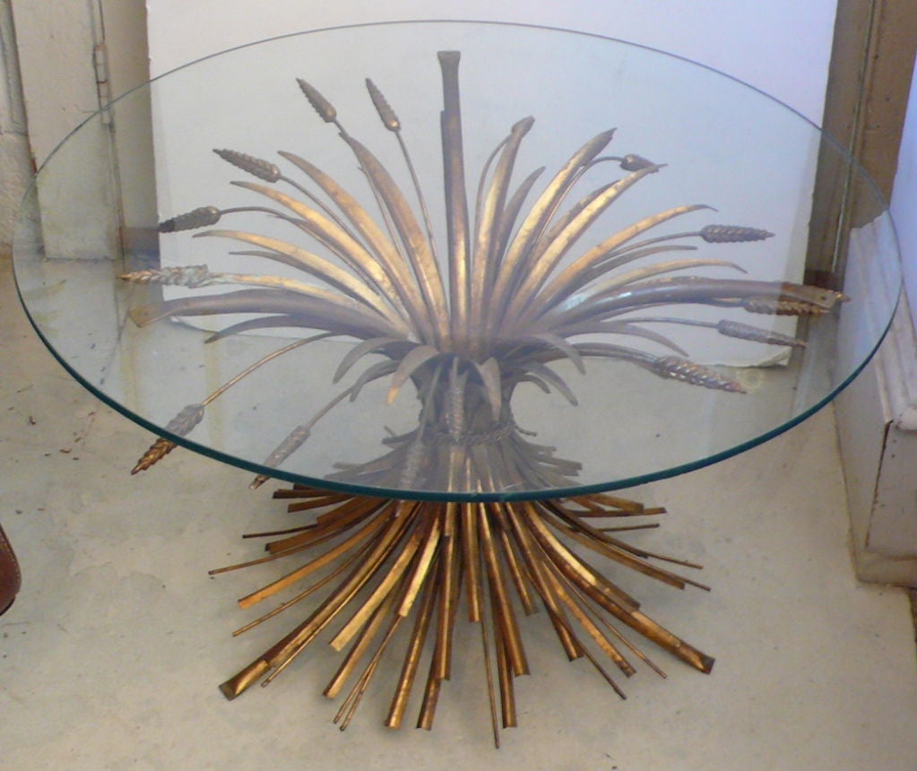 A Wheat Straw Occasinal Table in the style of Coco Chanel, Gilded Metal base, can take a larger top