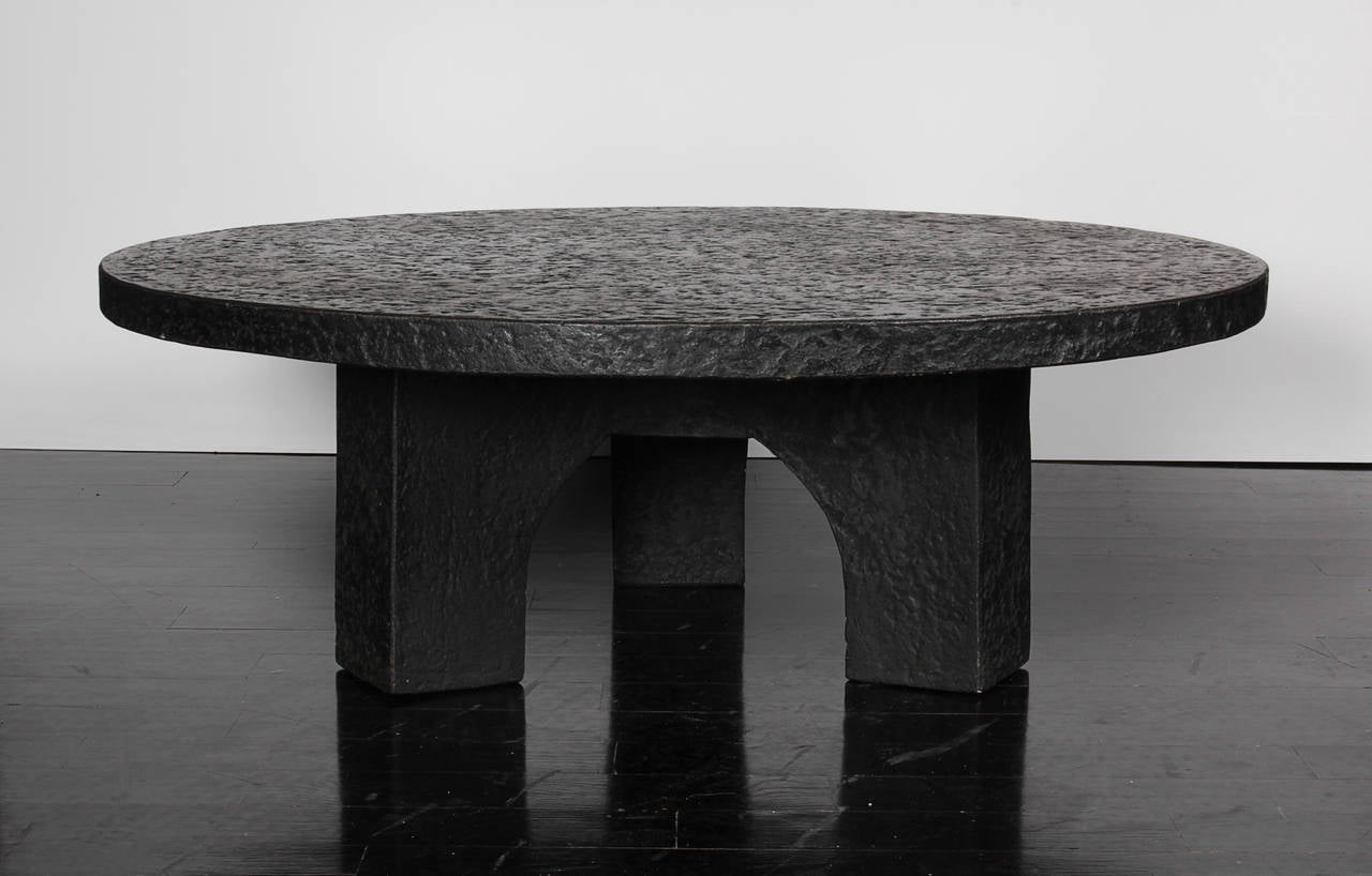 A black resin low table in the style of Ado Chale. Perfect for an interior or exterior setting, can live outside.