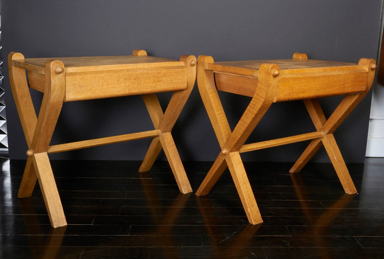 A pair of Guillerme et Chambron cerused oak side tables with a single-drawer, X-base and marquetry top.