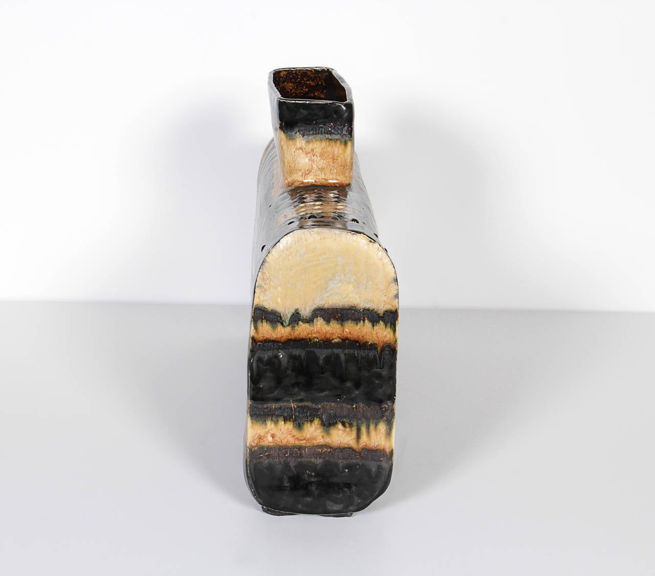 A very cool Missoni inspired glaze and a shape that sits nicely on any table,
this Italian vessel is quite stunning.