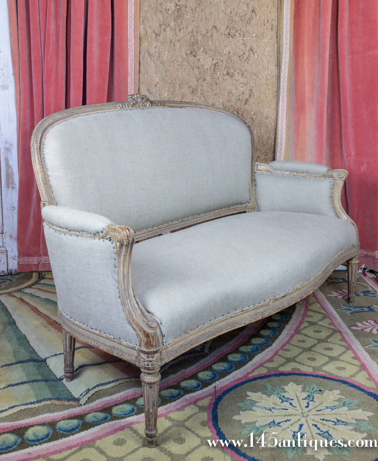 A Stunning French 19th Century Louis XVI Style Settee. Sold as is.
