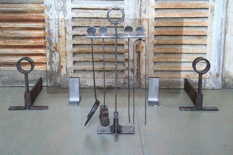 Set of French 1950’s Polished Iron Fireplace Tools, consists of glass screen and 4 piece tool set and andirons.