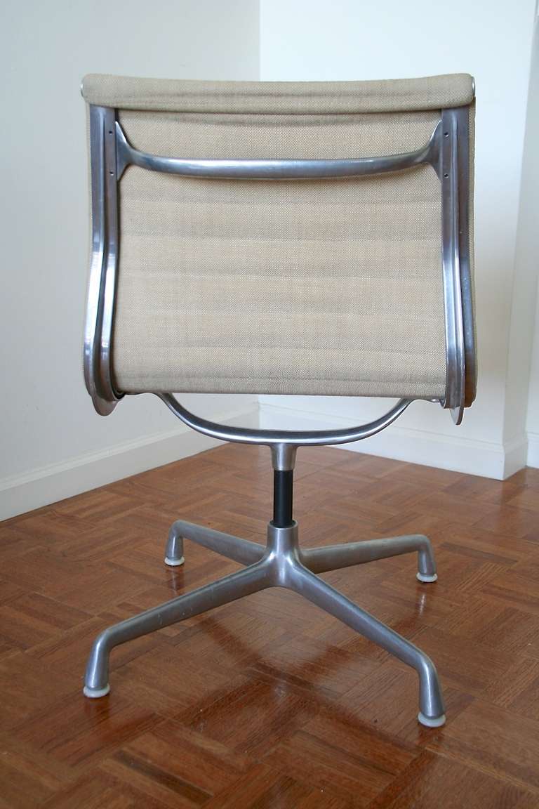 Upholstery Pair of Eames Swivel Chairs