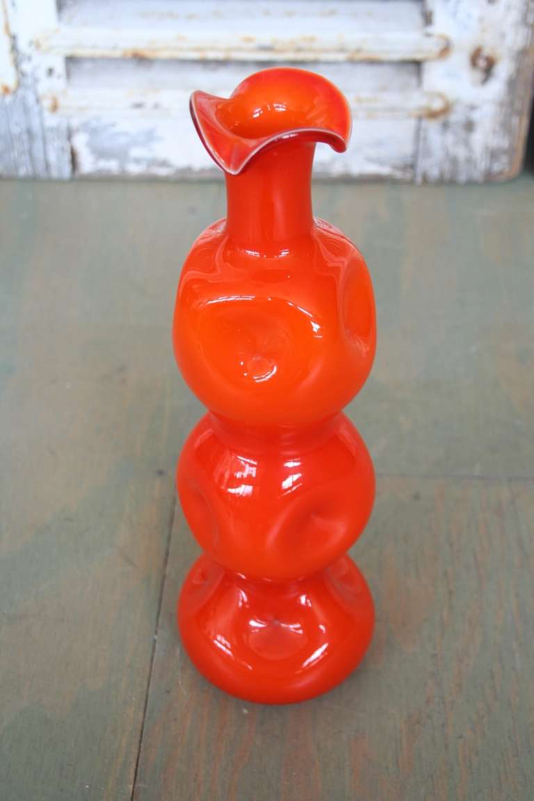 Bright orange cased, pinched glass vase circa 1960s.