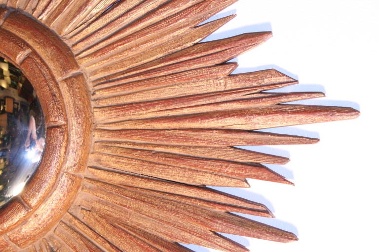 Spanish oval gilt wood convex mirror