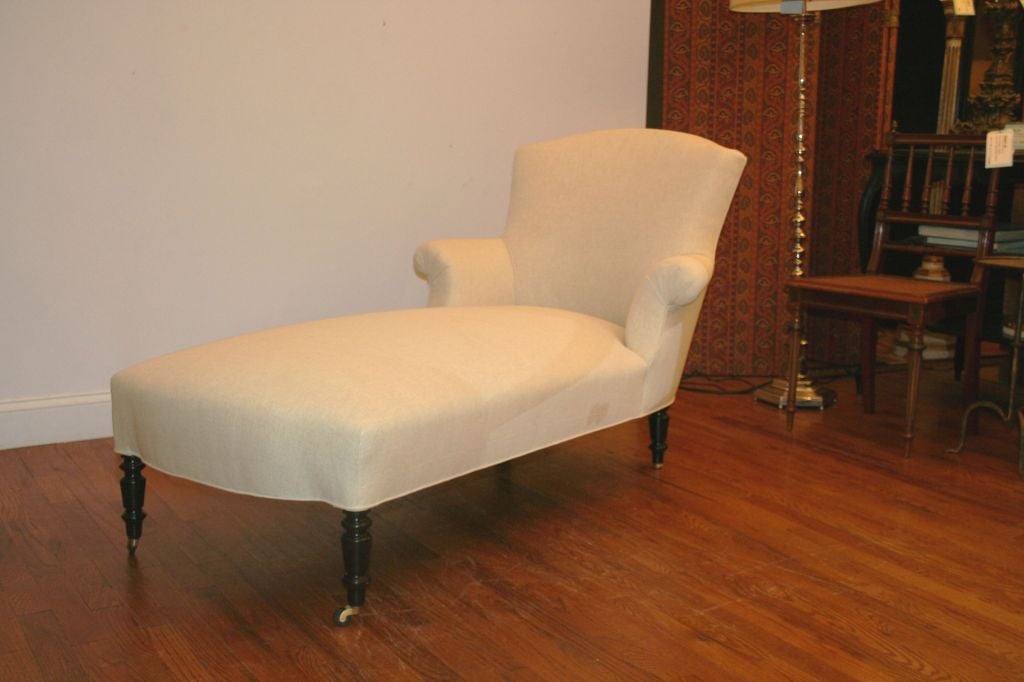Napoleon III period chaise  lounge, style Chapeau de Gendarme. Recently  upholstered  in  off white linen.