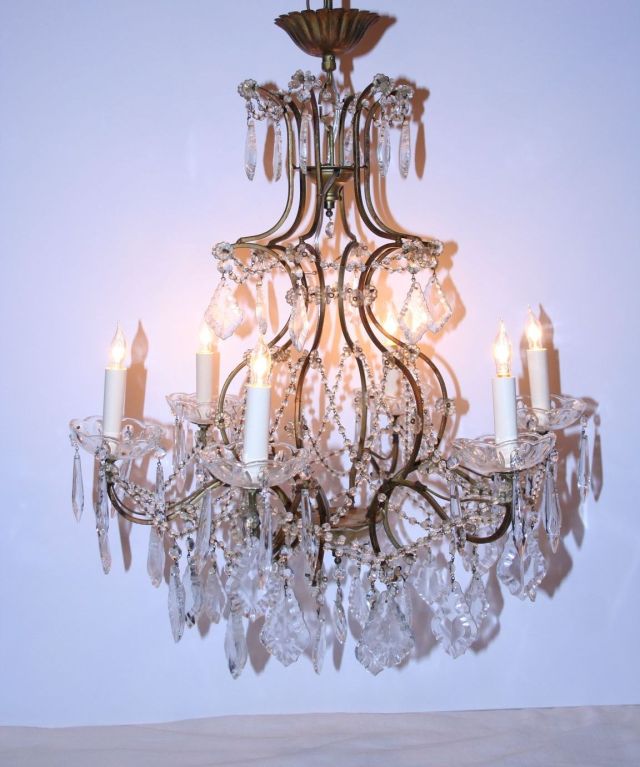 Delightful 6 armed crystal chandelier with gilt frame and lead crystals