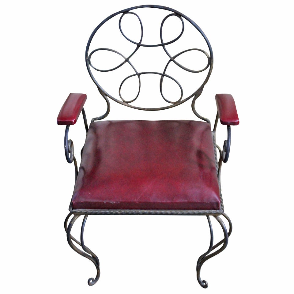 Ornate Wrought Iron Armchair in Oxblood Red Vinyl For Sale