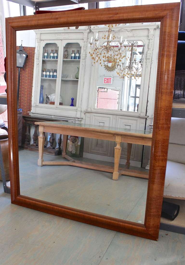 Large French, 1940s chestnut veneer framed mirror. This mirror is in excellent condition and has recently been polished. Wire mount on back for hanging.