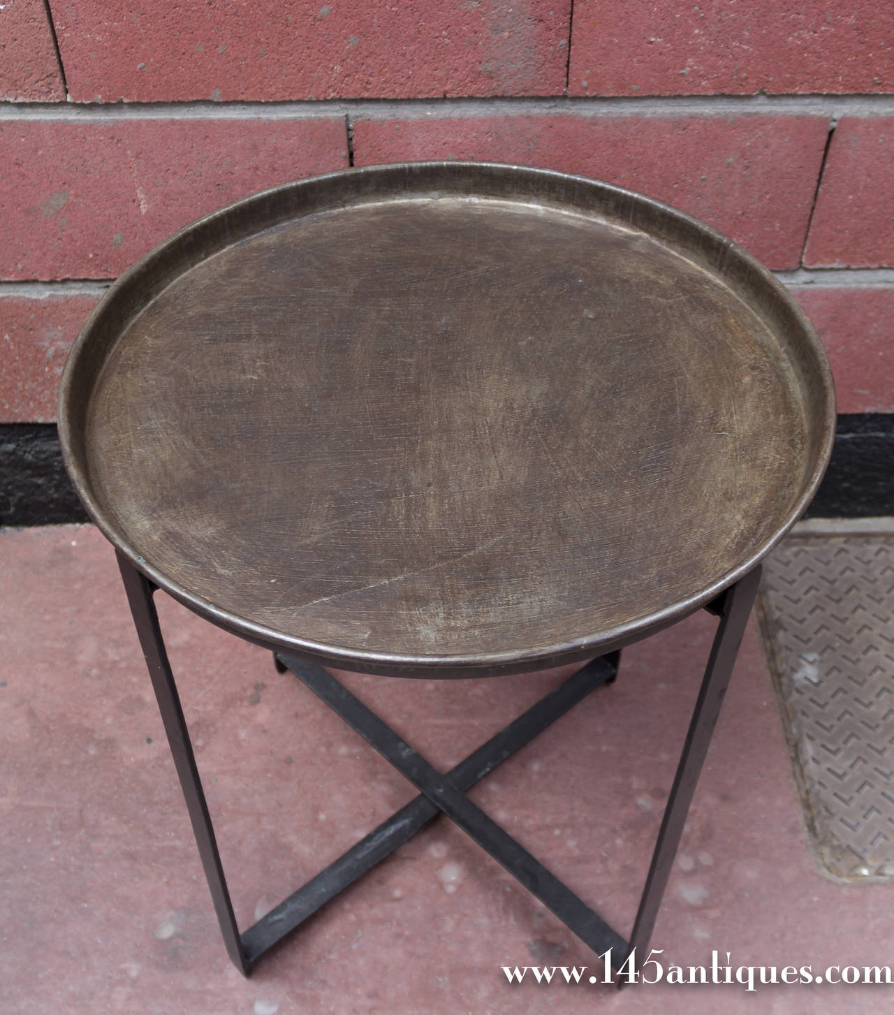 French industrial side table with removable metal tray and fold up base.