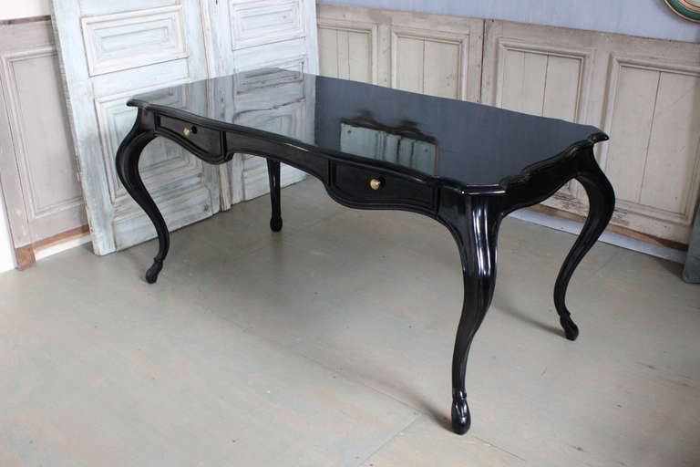 American writing desk with two drawers, recently  lacquered black. Circa 1950s
