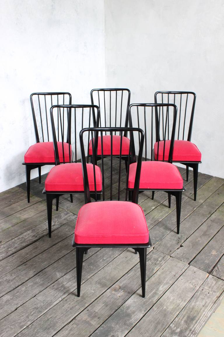 Wonderful set of six dining chairs, French, 1950s-1960s. Recently restored and ebonized. The upholstery is original. Designer unknown.