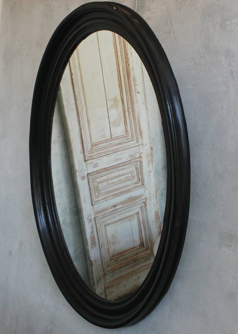 oval mirror with frame