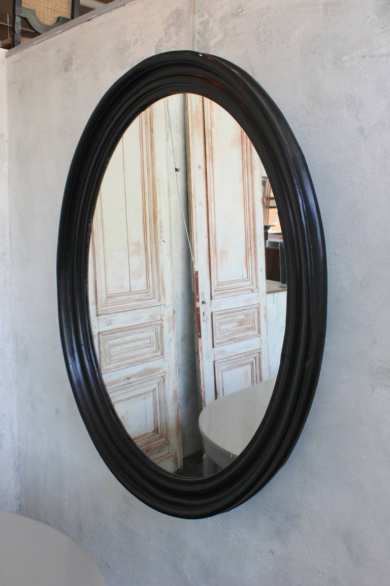 Large Napoleon III  Oval Mirror with Black Painted Frame In Fair Condition In Buchanan, NY