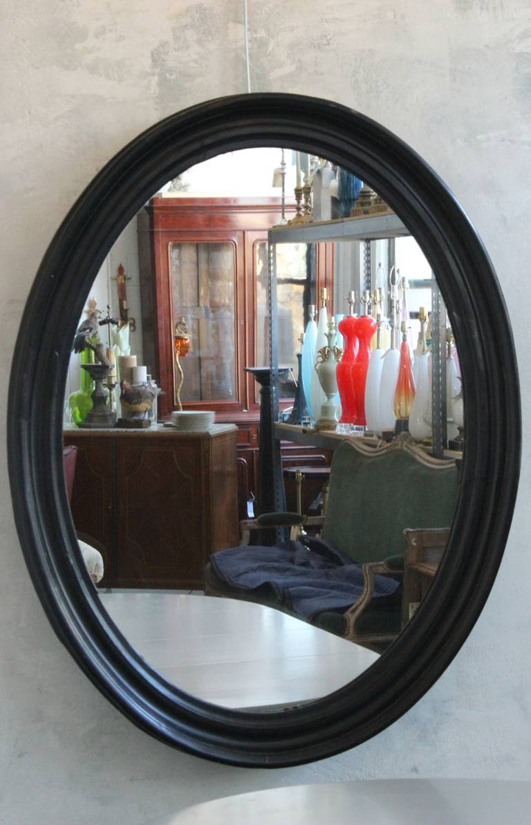 19th Century Large Napoleon III  Oval Mirror with Black Painted Frame