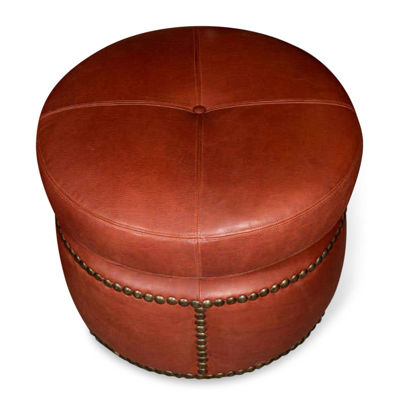 Pair of rust-colored leather poufs with studded decoration (original studs), covered in fine Morocco leather, French, 1920s. Diameter 23 in, height 17 1/2 in. 

Price for the pair.