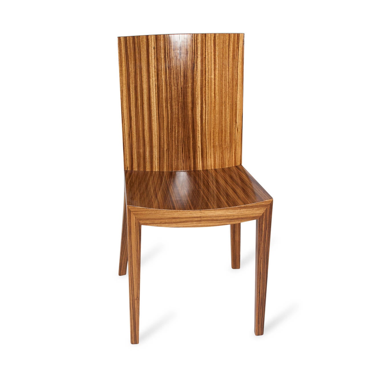 Zebrawood side chair, curved back and slightly curved seat, on tapered legs, by Karl Springer, American, 1970s. Measures: 18 ½” W, 16 ¾” D, 18 ½” SH, 35” H.

 
