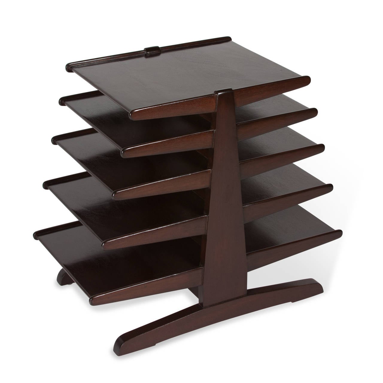 Dark mahogany magazine rack with graduating shelves by Edward Wormley for Dunbar, American 1950s. 28” at widest point, 15 ¼” at deepest point, 24 ¼” h.