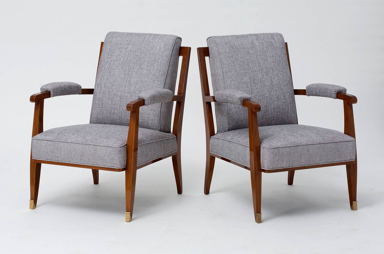 A pair of low armchairs in beech with gilt metal sabots by Maison Leleu.

Designed for the Villa Médy Roc in cap d’Antibes (South of France), for which Maison Leleu was chosen to provide new furniture, lighting, and carpets in 1957. This was one
