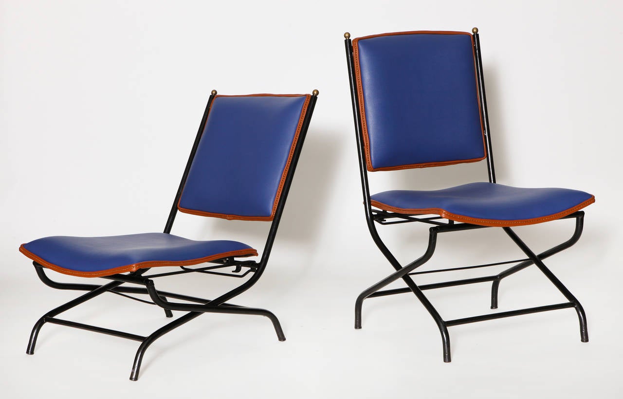 French Jacques Adnet, Pair of leather and iron adjustable chairs, France, c. 1950