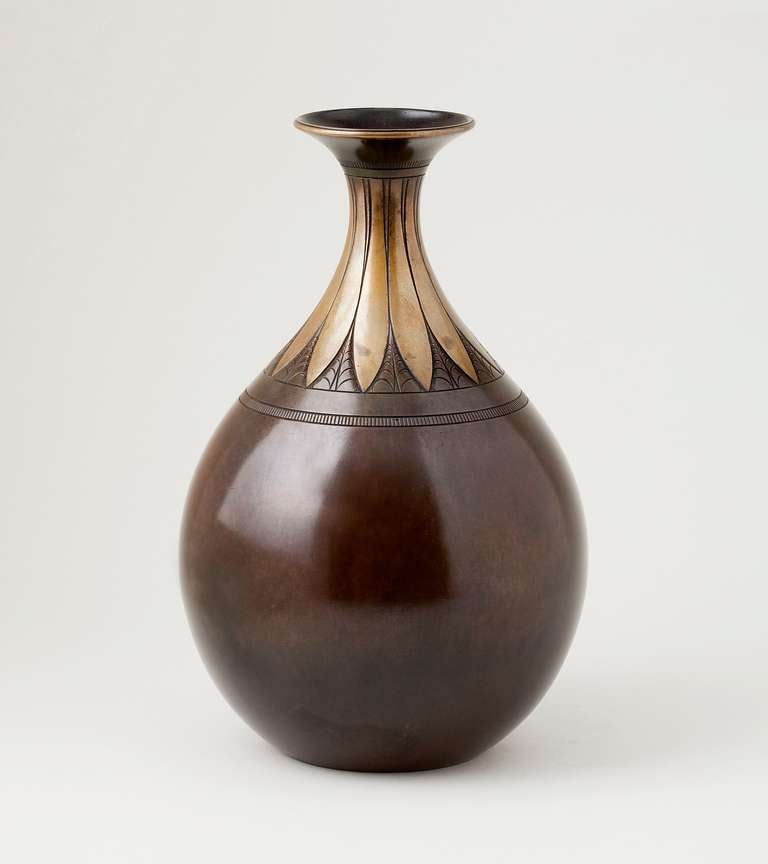 A patinated bronze vase by Just Andersen

Marked “Just” within a triangle, “Denmark”            
Numbered: B 73
