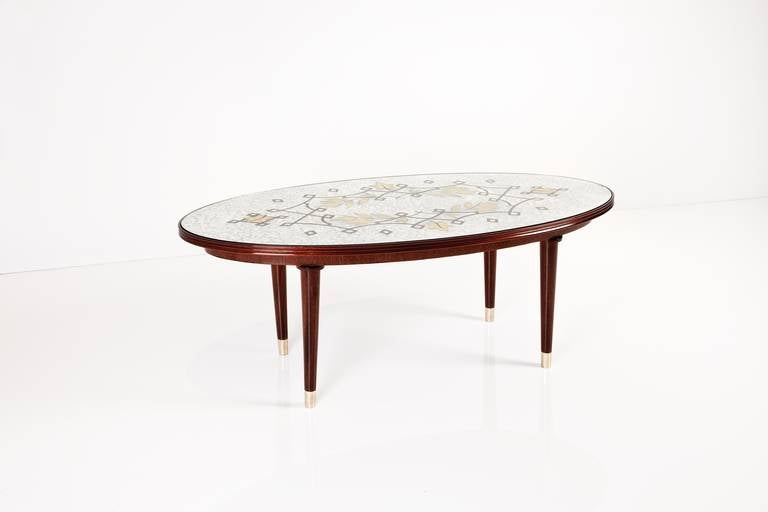 French Jules Leleu, Mahogany coffee table with eglomisé glass top, France, c. 1948 