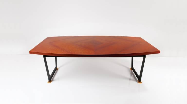 Blond mahogany table with patinated steel and gilt bronze base by Maison Leleu

A larger version of this model is entered under: #5969 Grande table, Salle de conference in Leleu’s Livre des creations (Leleu's entry log of pieces produced)

For