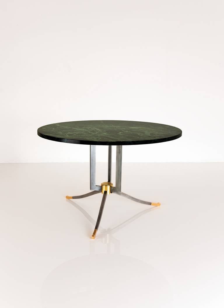 Rare steel and gilt-bronze coffee table by Jules Leleu with its original green marble.  

Numbered: 5065

Bibliography: Illustrated in Leleu Décorateurs Ensembliers by F.Siriex, Editions Monelle Hayot, p. 413