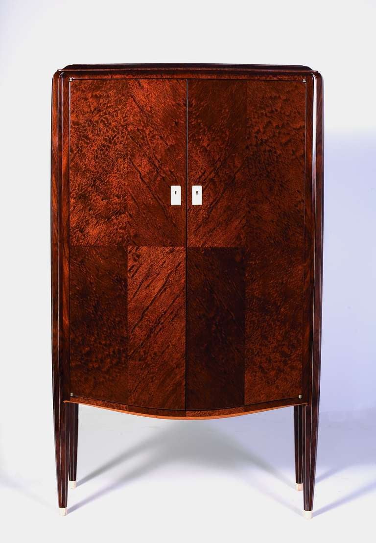 Fine Art Deco two-door mahogany cabinet Jules Leleu, with a sycamore interior