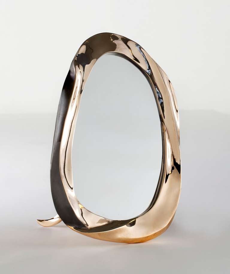 Gilt bronze table mirror by Aldus. Can be paired with the 