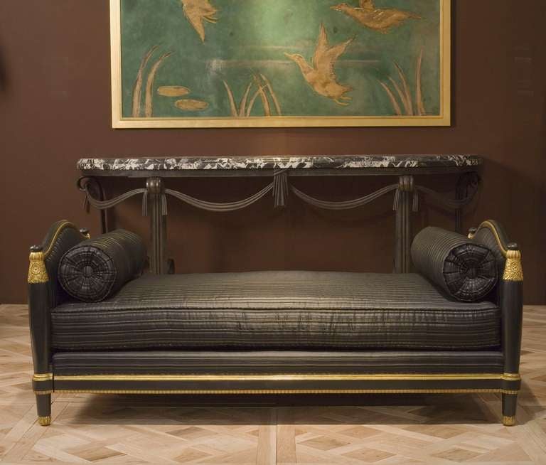 An Art Deco daybed by Paul Follot in gilt, carved wood and bois noirci

For the illustration of a closely related model see Le Mobilier du XXe siècle, Dictionnaire des créateurs by Pierre Kjellberg, p.226