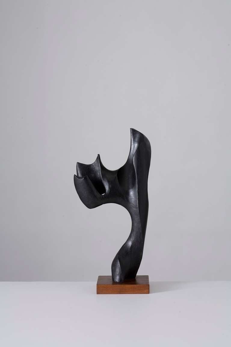 Carved ebonized wood sculpture by Mario Dal Fabbro

Signed.