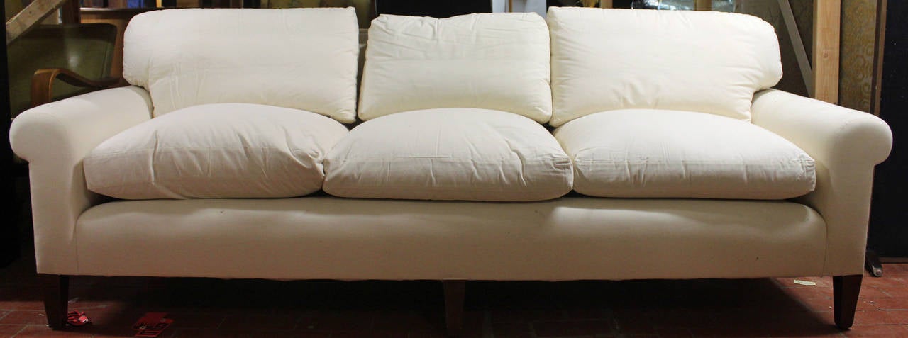 Elegant and fully refurbished sofa in muslin. The seat composition is of foam core and down wrap, the back cushions are of down/down feathers. Measures: 90” x 35” x 34”. Arm height is 24”, seat height is 18 ½”.