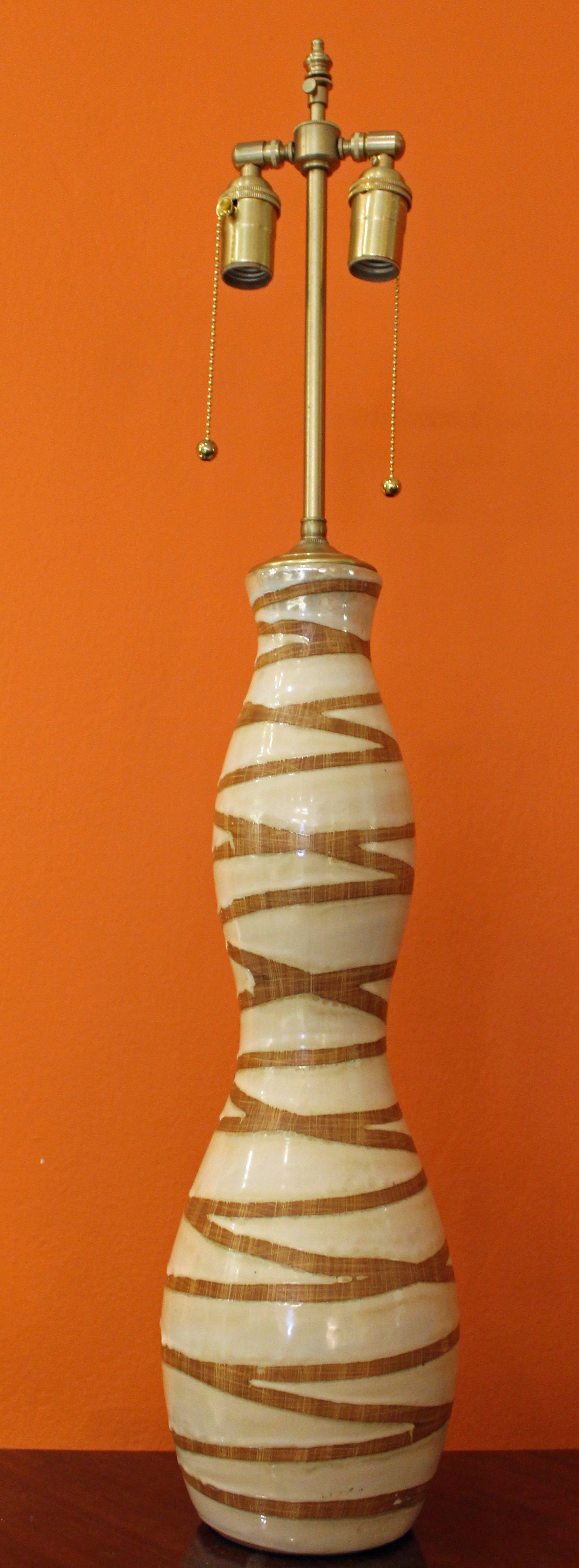 Pair of vintage "bondage" design ceramic vases with lamp application