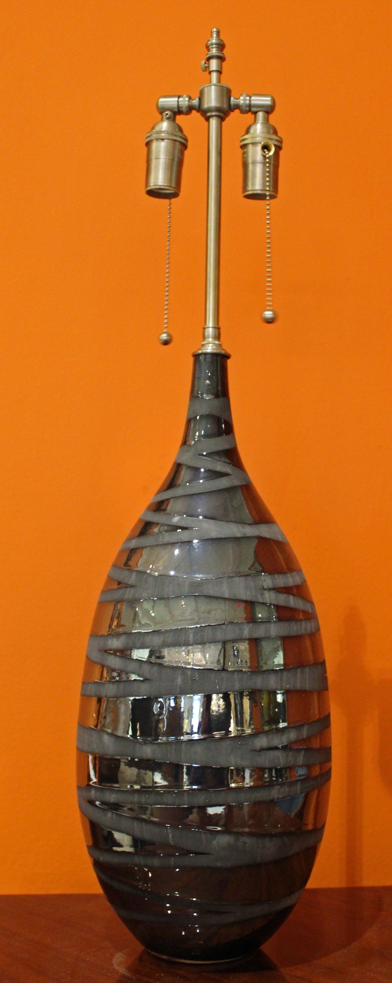 pair of black mirrored "bondage" vases with lamp application