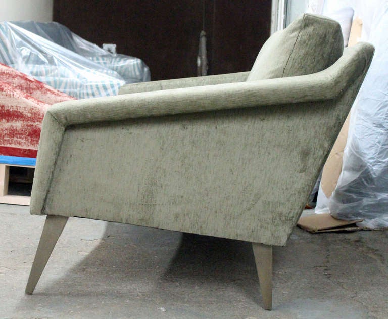 Geo Ponti inspired loveseat in a soft sage velvet with matching tapered legs. Single seat in down wrapped foam core. Loose back cushions in 50/50 down feather.