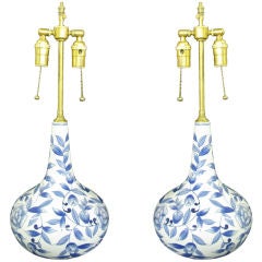 Pair of elegant long neck vases with lamp application.