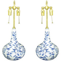 Pair of elegant long neck vases with lamp application.