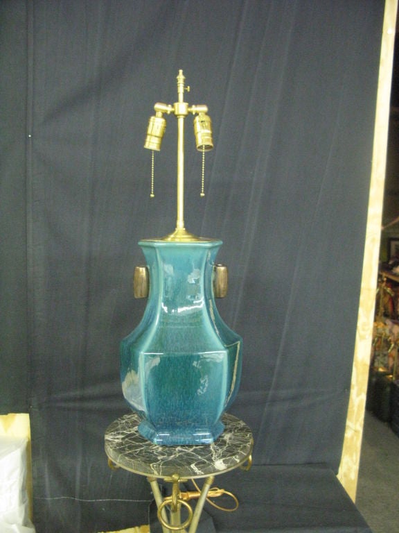 Pair of fabulous  Glazed blue green Vases with lamp application.